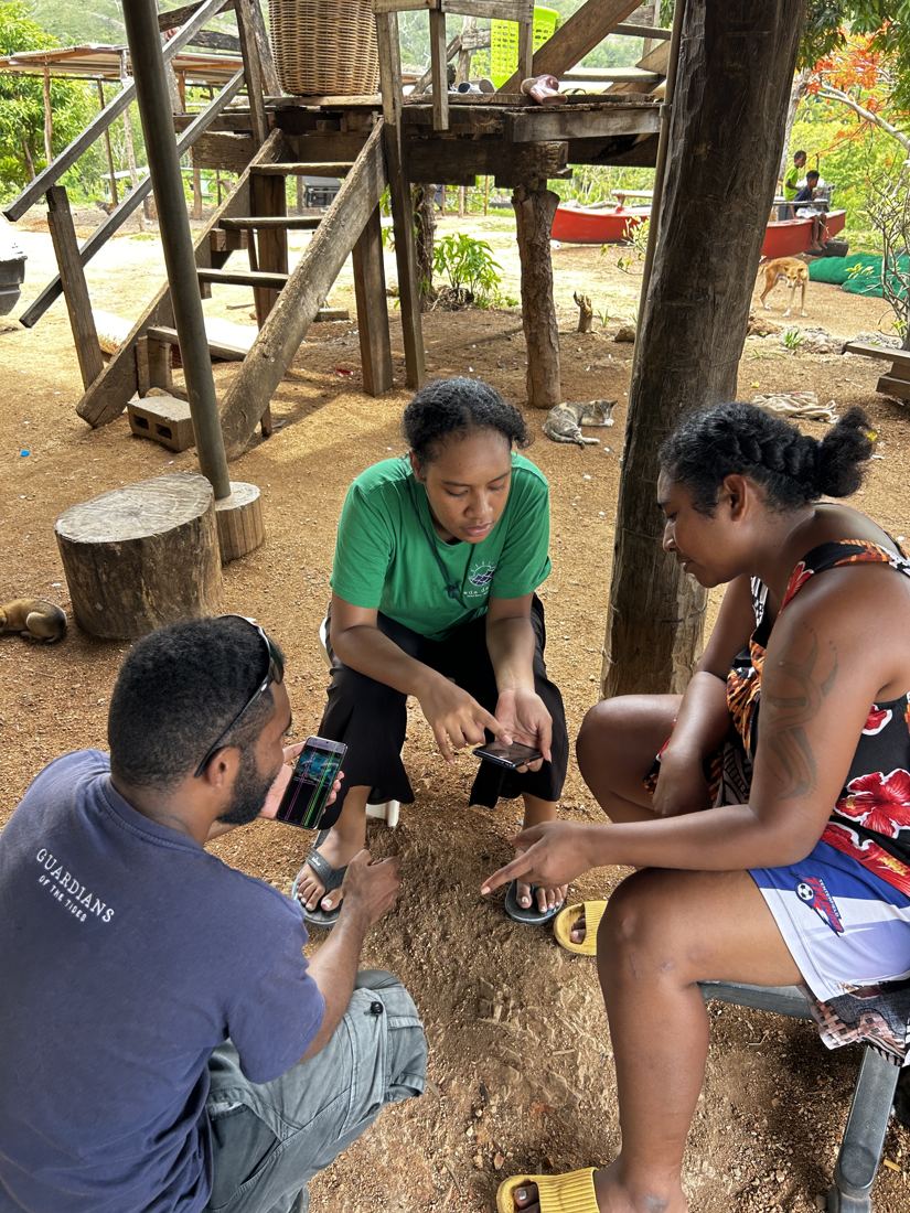 EcoScholars conducting a traditional knowledge interview in the village